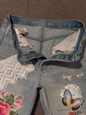 American Eagle Outfitters Light Blue Denim Jeans with Floral & Butterfly Patches